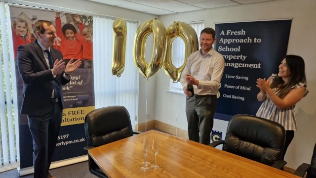 Paul David and Amie celebrating 100 Schools